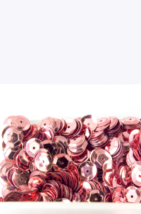 Adding sequins to dance costumes